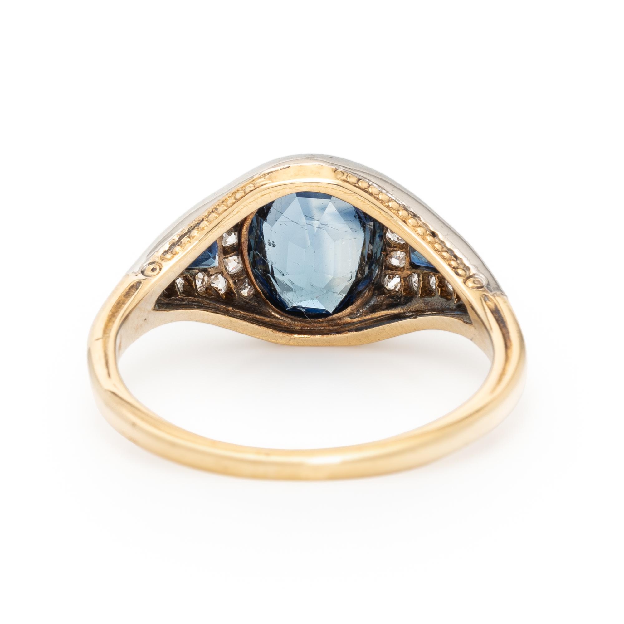 SYNTHETIC SAPPHIRE, DIAMOND, AND BICOLOR GOLD RING