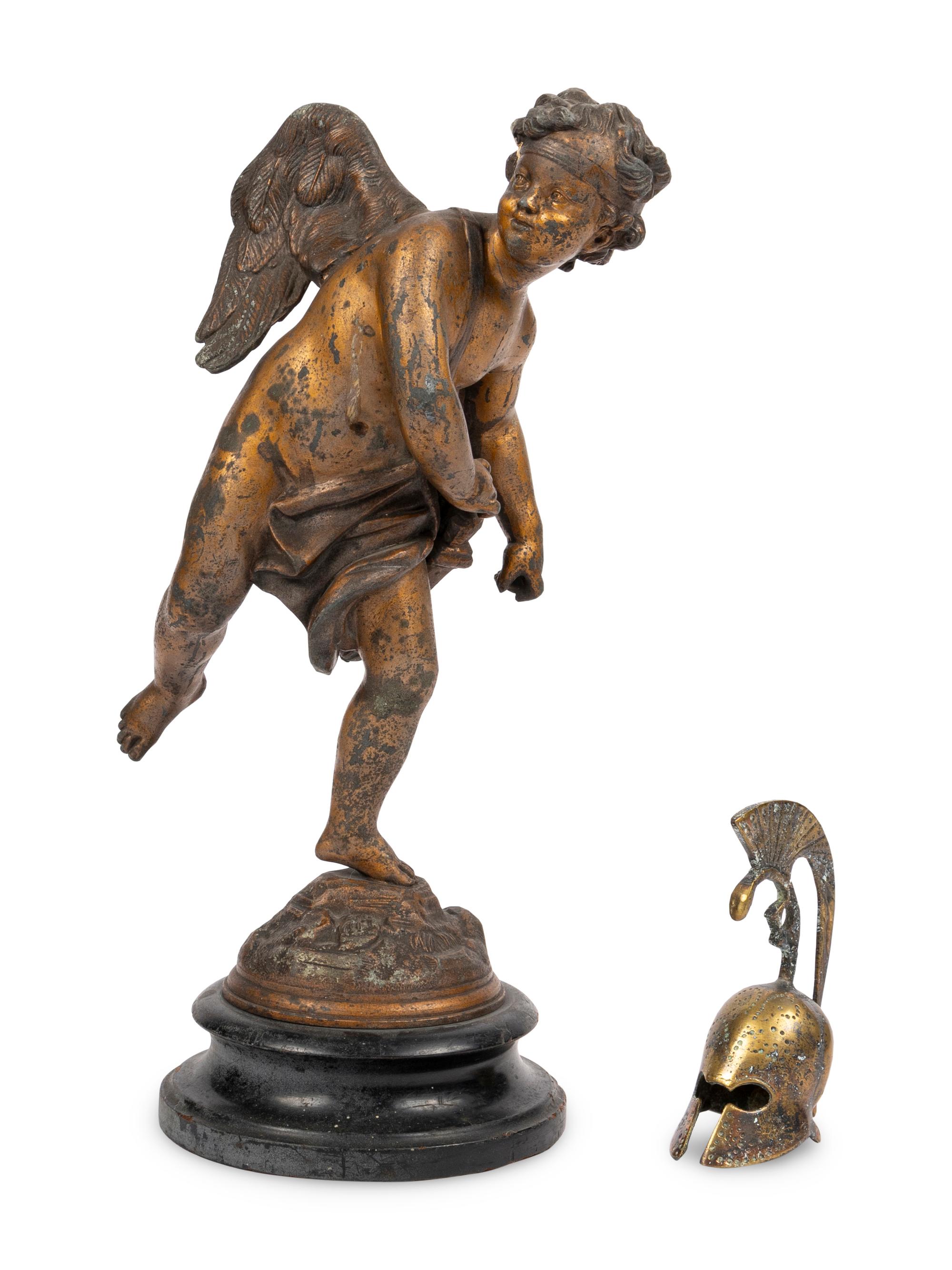 A Continental Gilt Metal Figure of Cupid