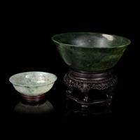 A Chinese Jadeite Bowl and a Spinach Jade Bowl, Early-Mid 20th Century 近代 翡翠、碧玉碗各一