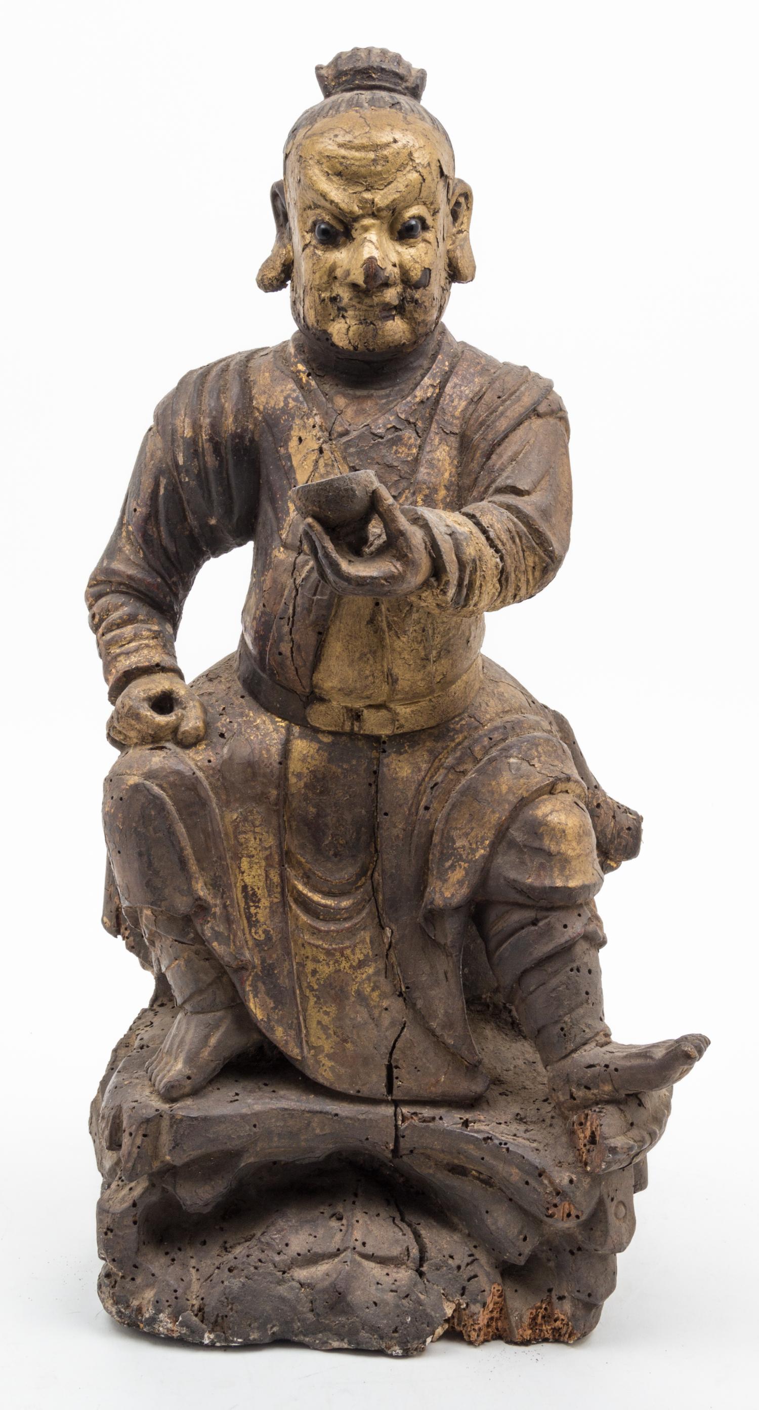 A Gilt Lacquered Wood Figure of an Immortal. Height 20 1/2 inches.