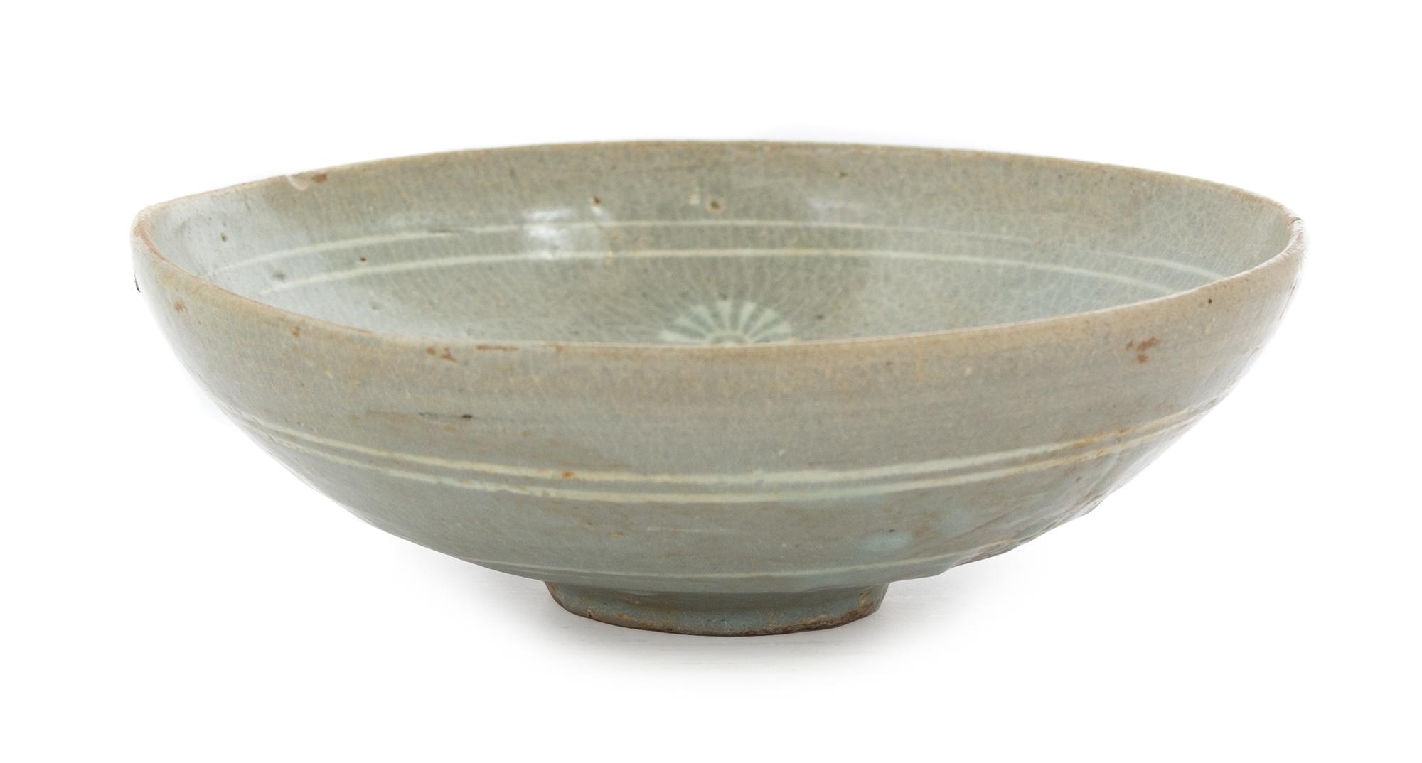 A Korean Celadon Glazed Stoneware Bowl KORYO DYNASTY, 13TH/14TH CENTURY Diameter 7 1/4 inches. — KORYO DYNASTY, 13TH/14TH CENTURY