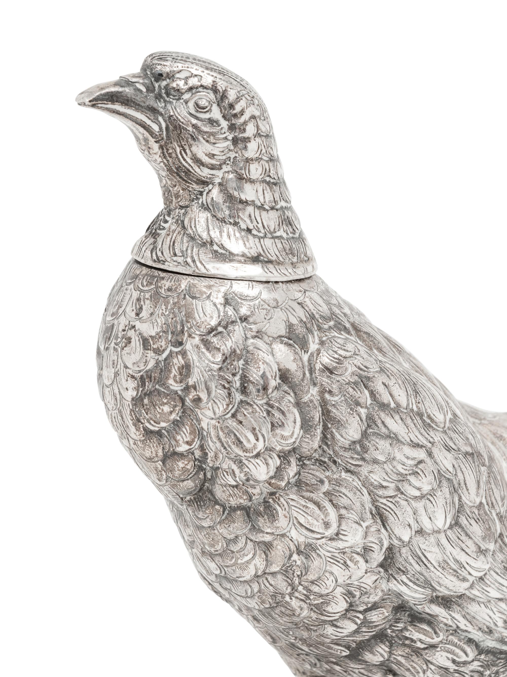 A Pair of German Silver Pheasant Table Ornaments