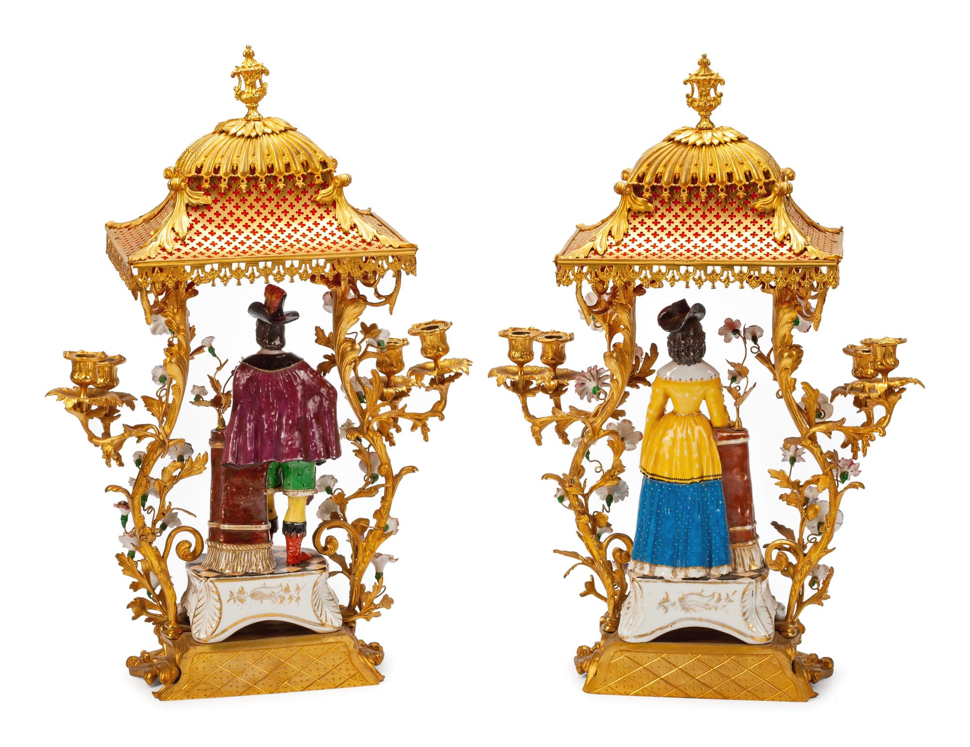 A Pair of French Gilt Bronze and Porcelain Four-Light Candelabra