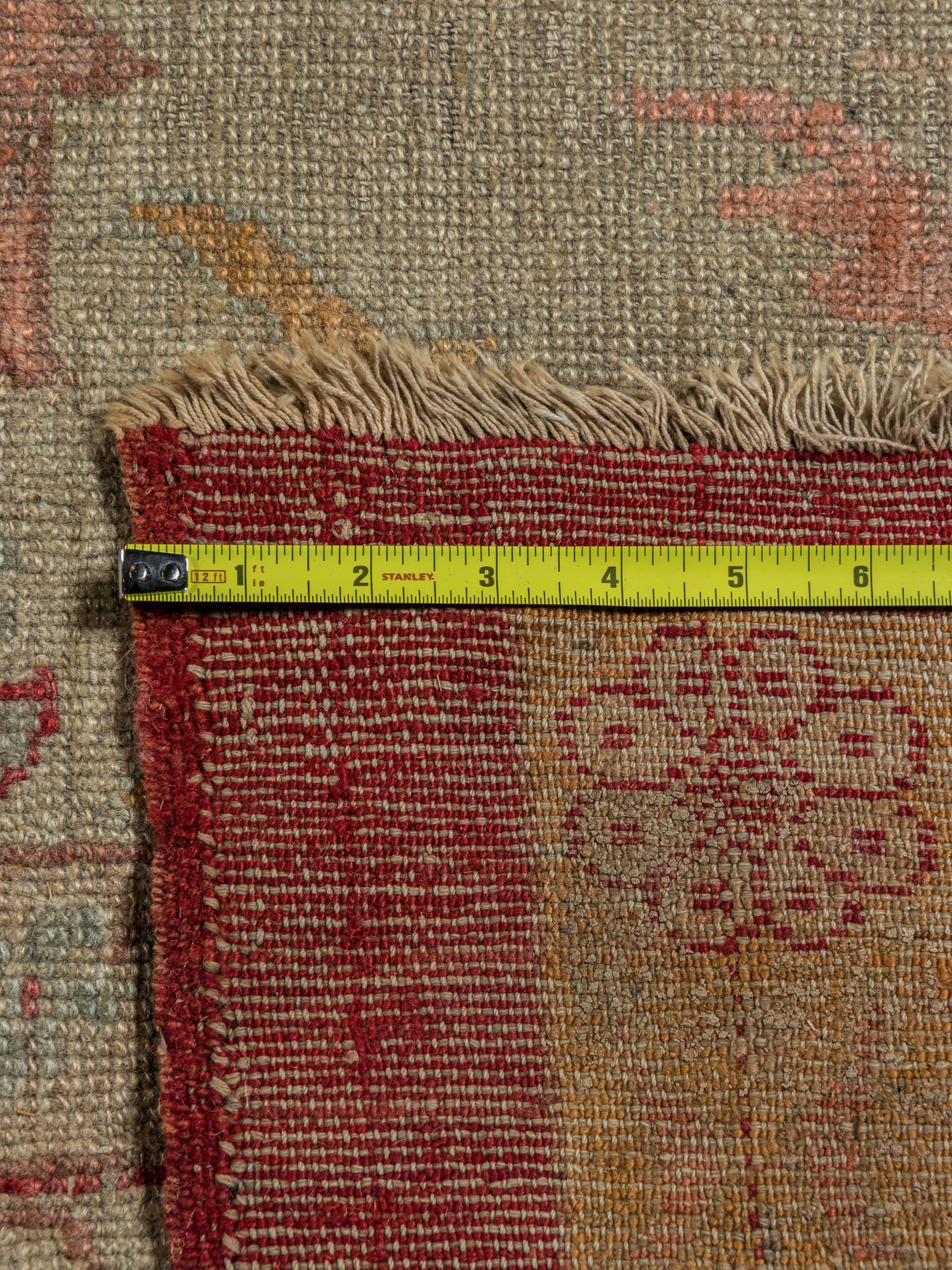 An Oushak Wool Rug