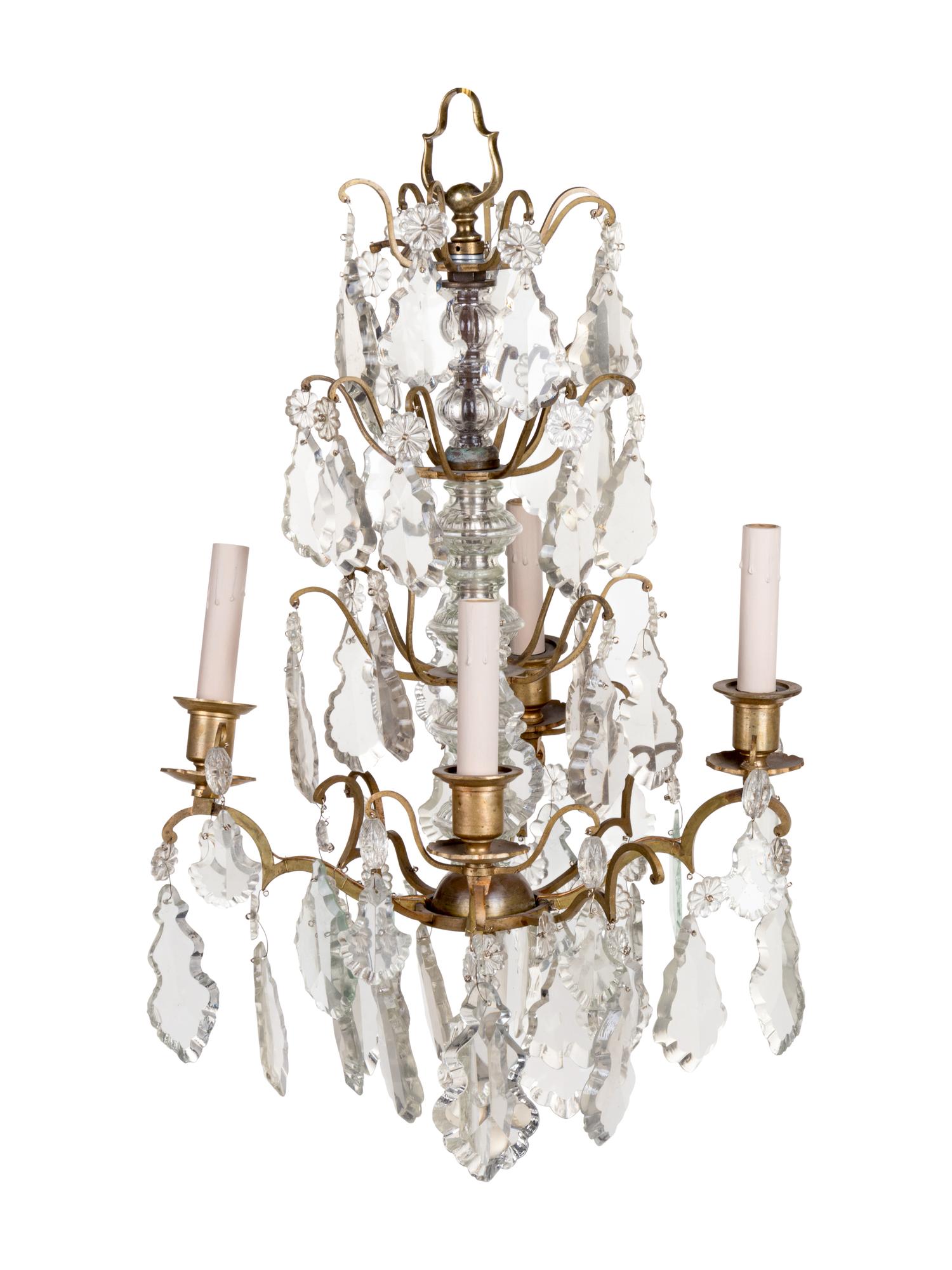 A French Gilt Metal and Cut Glass Four-Light Chandelier