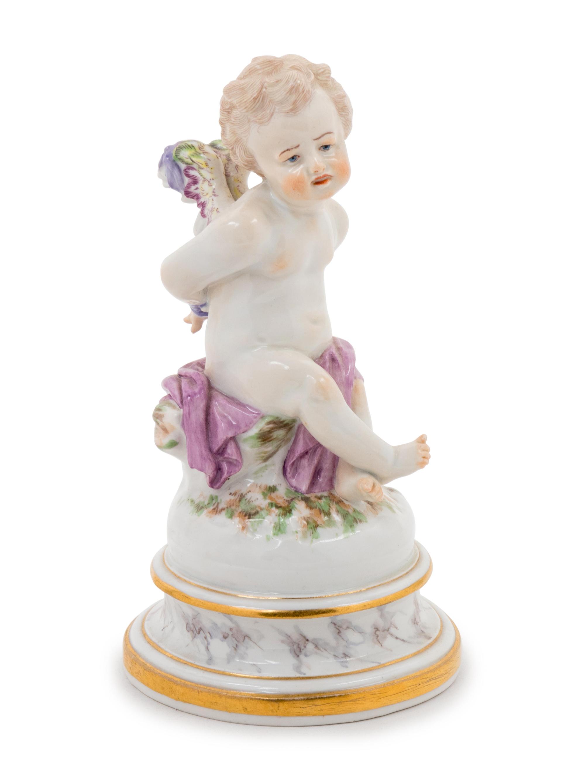 A Meissen Porcelain Figure of Cupid with Bound Wings and Hands