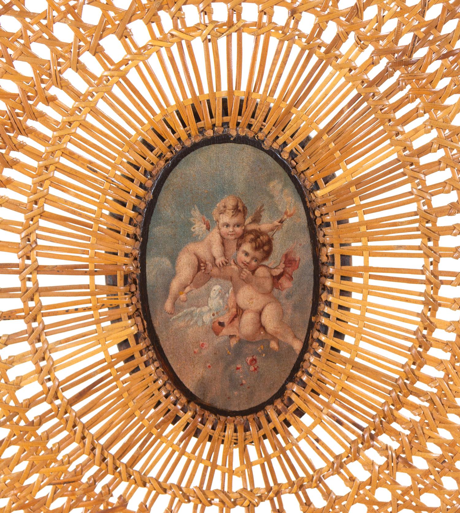 An Edwardian Painted Beechwood Cane Upholstered Armchair