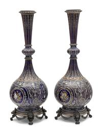 A Pair of Continental Gilt and Enameled Cobalt Glazed Porcelain Vases