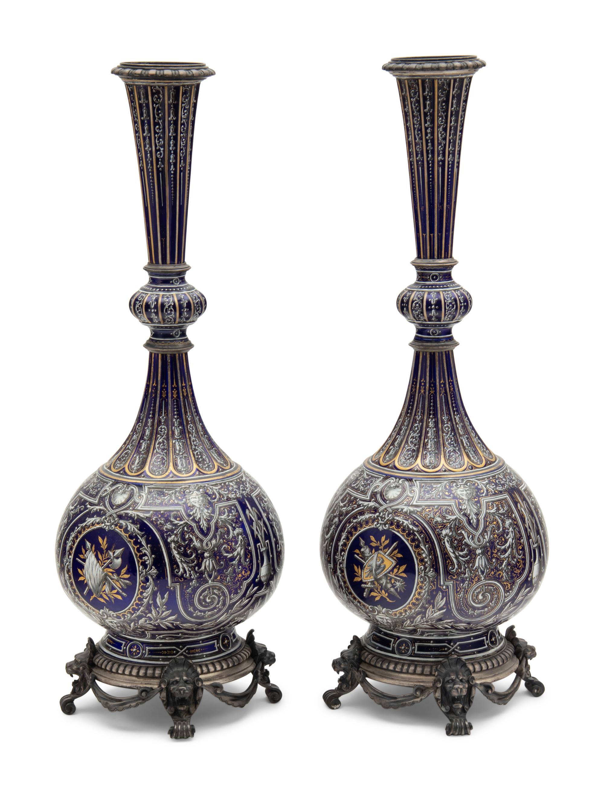 A Pair of Continental Gilt and Enameled Cobalt Glazed Porcelain Vases