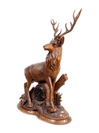 A Black Forest Carved Oak Stag-Form Mantel Clock