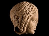 An Etruscan Terracotta Votive Half-Head