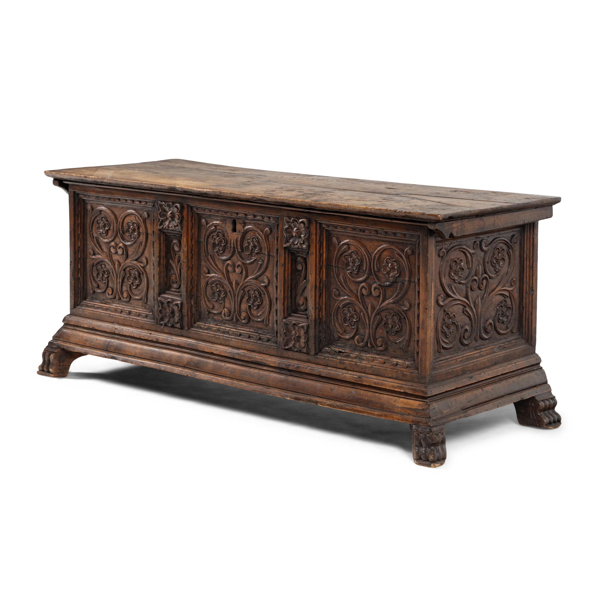 An Italian Carved Walnut Cassone
