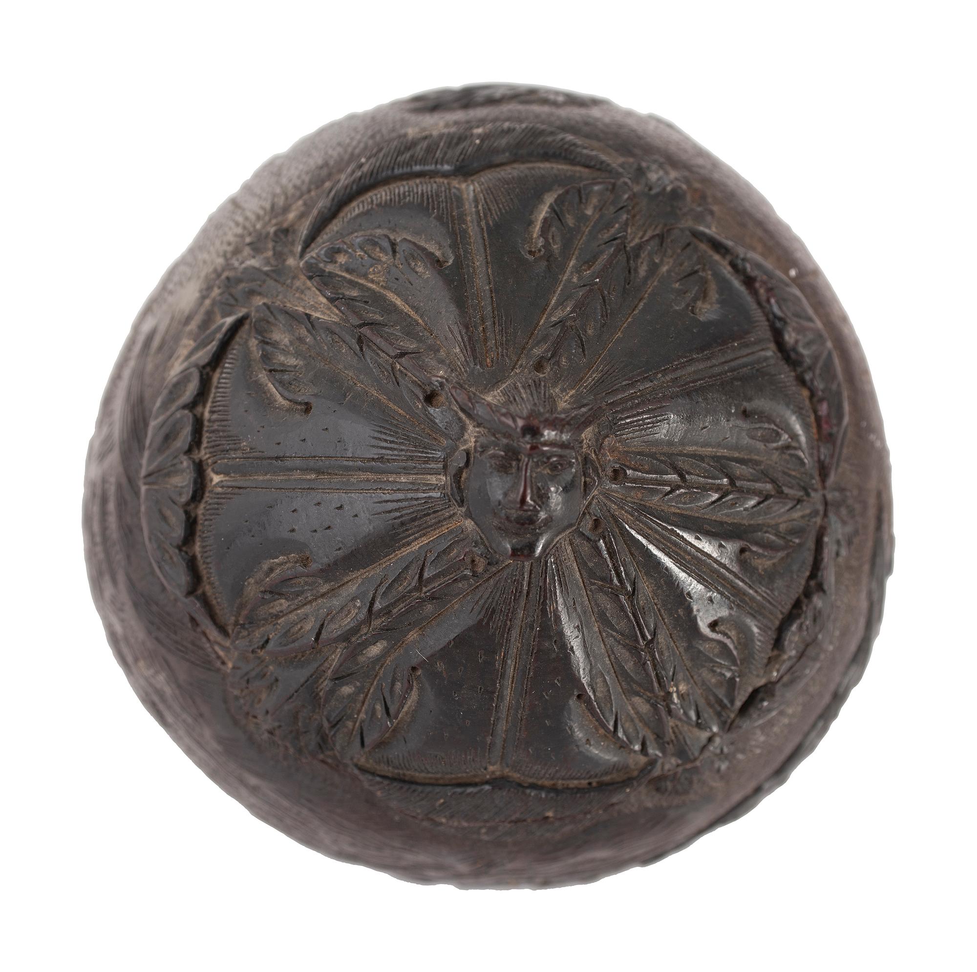 A Carved Coconut Depicting a Grisly American Indian Scene