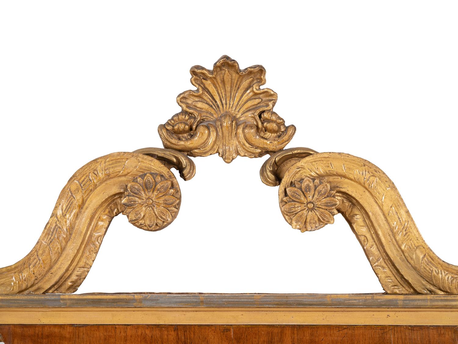 A George II Parcel Gilt Walnut Mirror