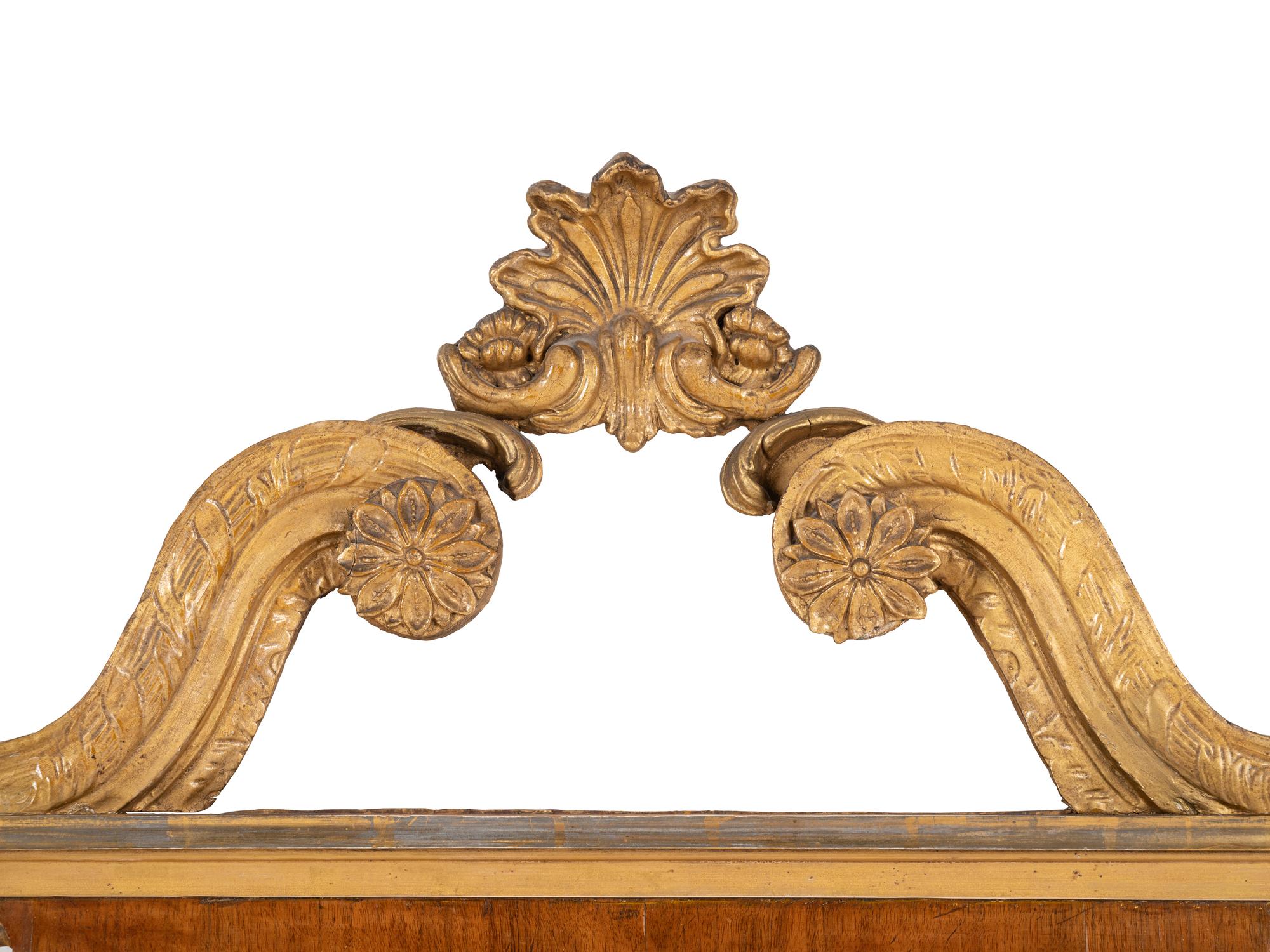 A George II Parcel Gilt Walnut Mirror