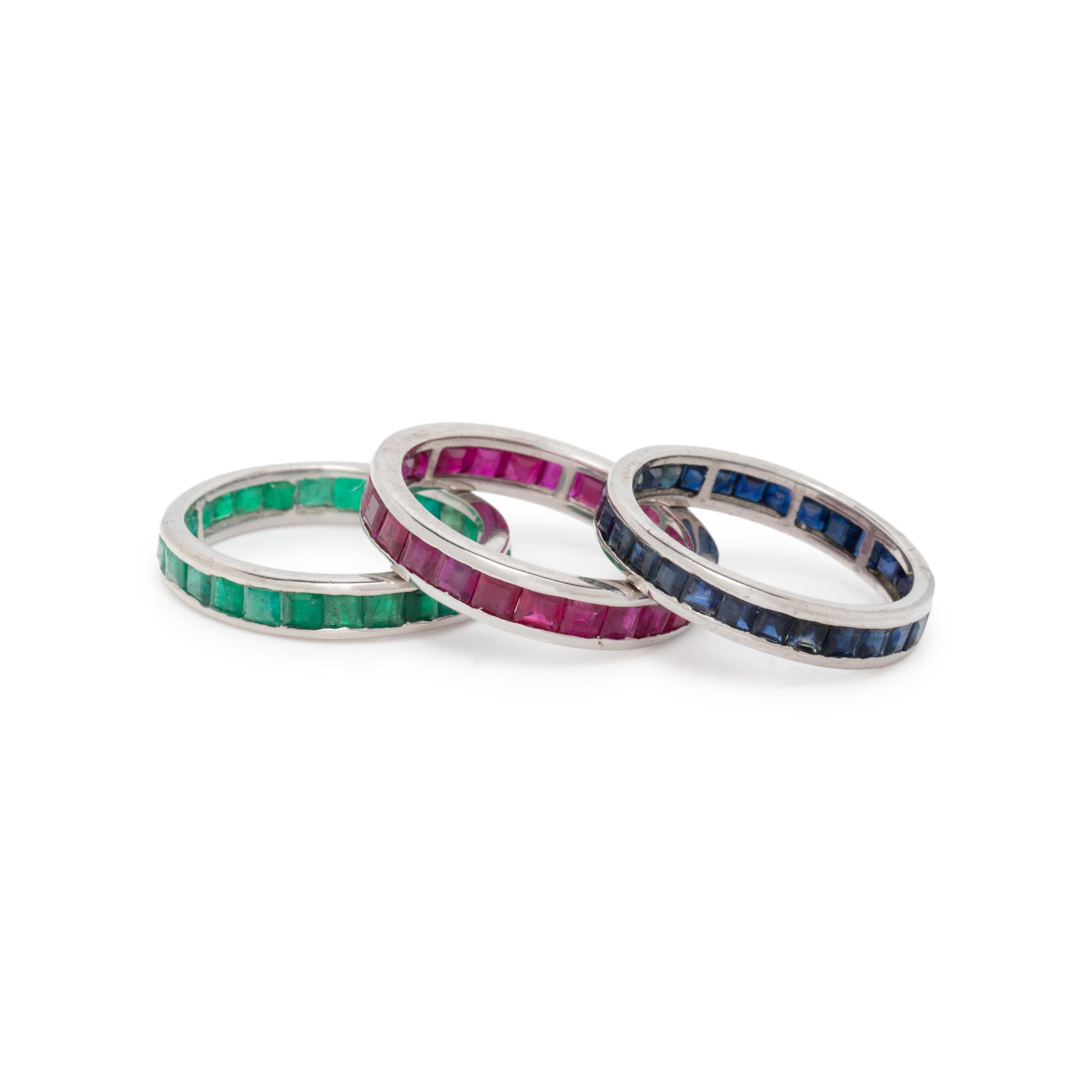 COLLECTION OF RUBY, SAPPHIRE, AND EMERALD BANDS