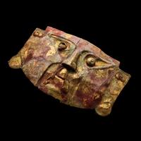 A Chimu Metal Mask with Red Pigment