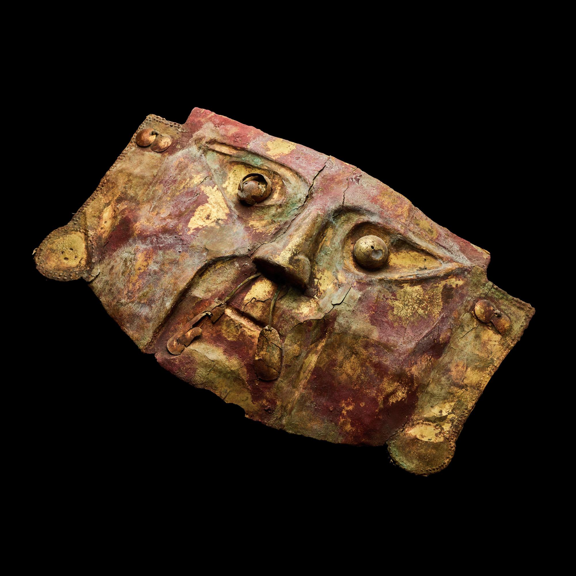 A Chimu Metal Mask with Red Pigment