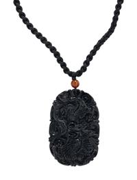 CARVED BLACK JADE PENDANT