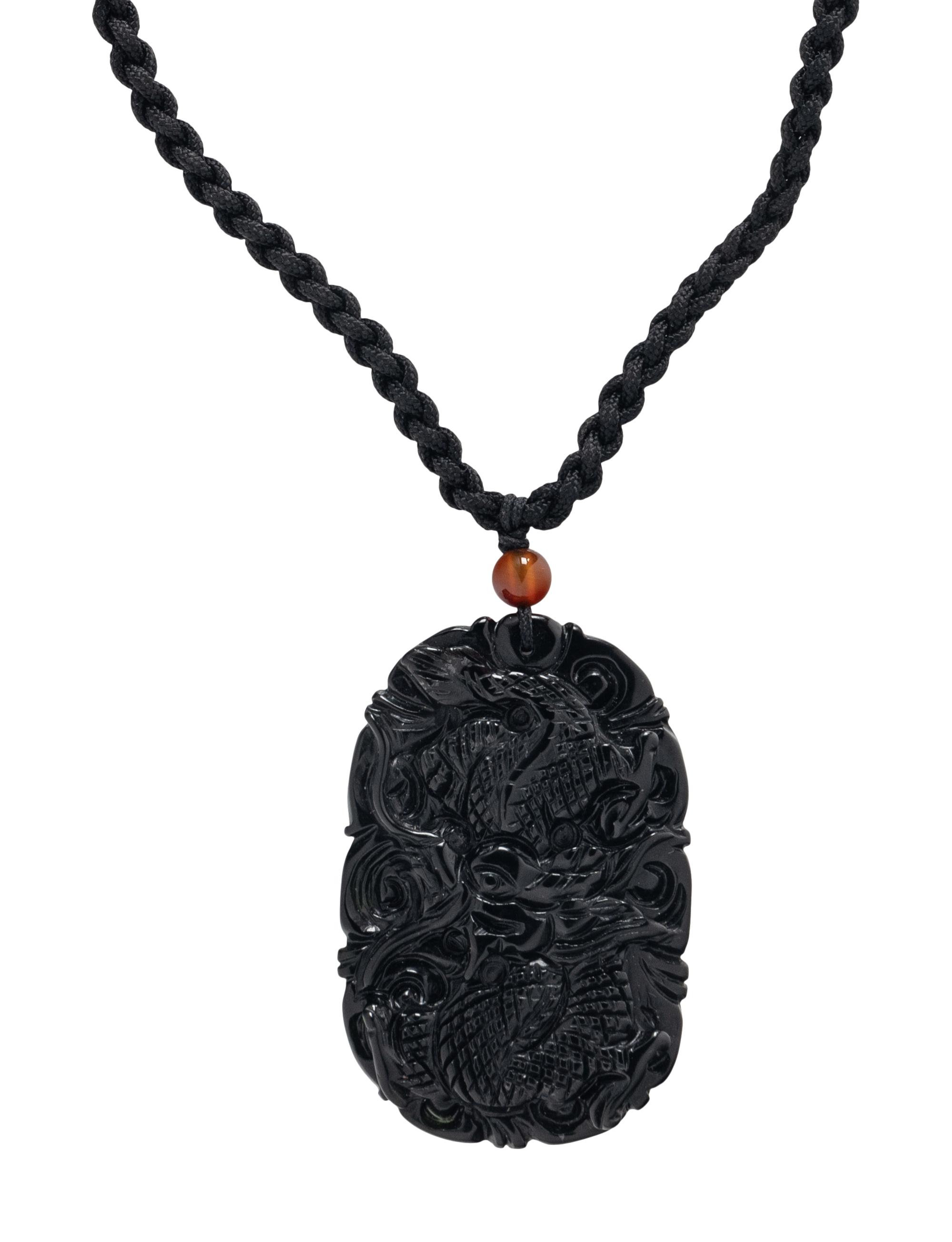 CARVED BLACK JADE PENDANT