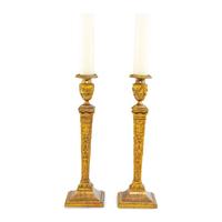 A Pair of Continental Gilt Iron Candlesticks