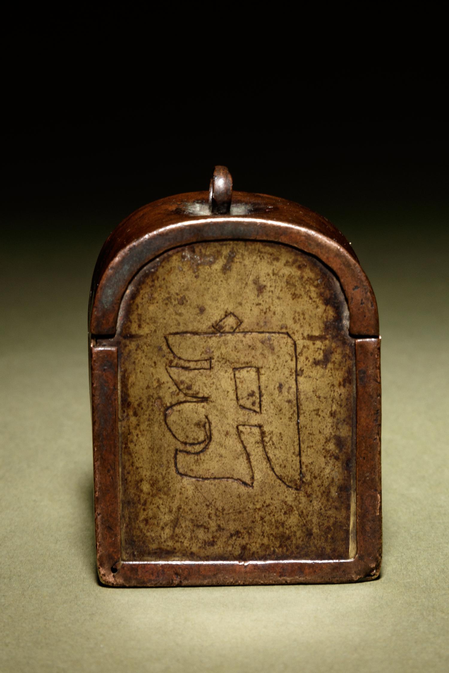 A White Jade Figure of Buddha with a Small Bronze Shrine