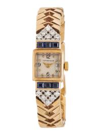 TIFFANY & CO., RETRO, 14K YELLOW GOLD, SAPPHIRE AND DIAMOND WRISTWATCH