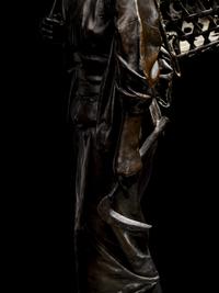 A Bronze Okimono of a Lady