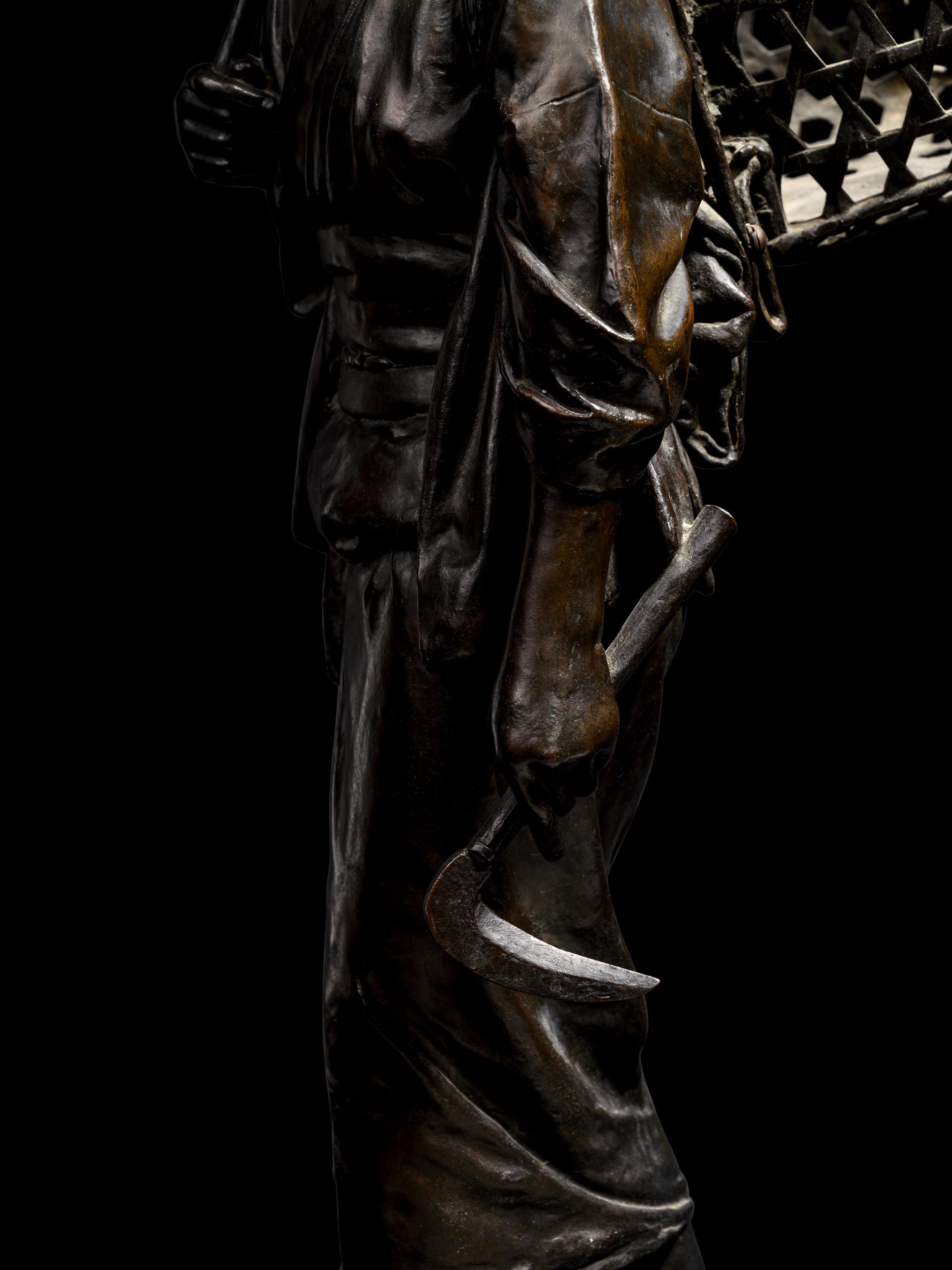 A Bronze Okimono of a Lady
