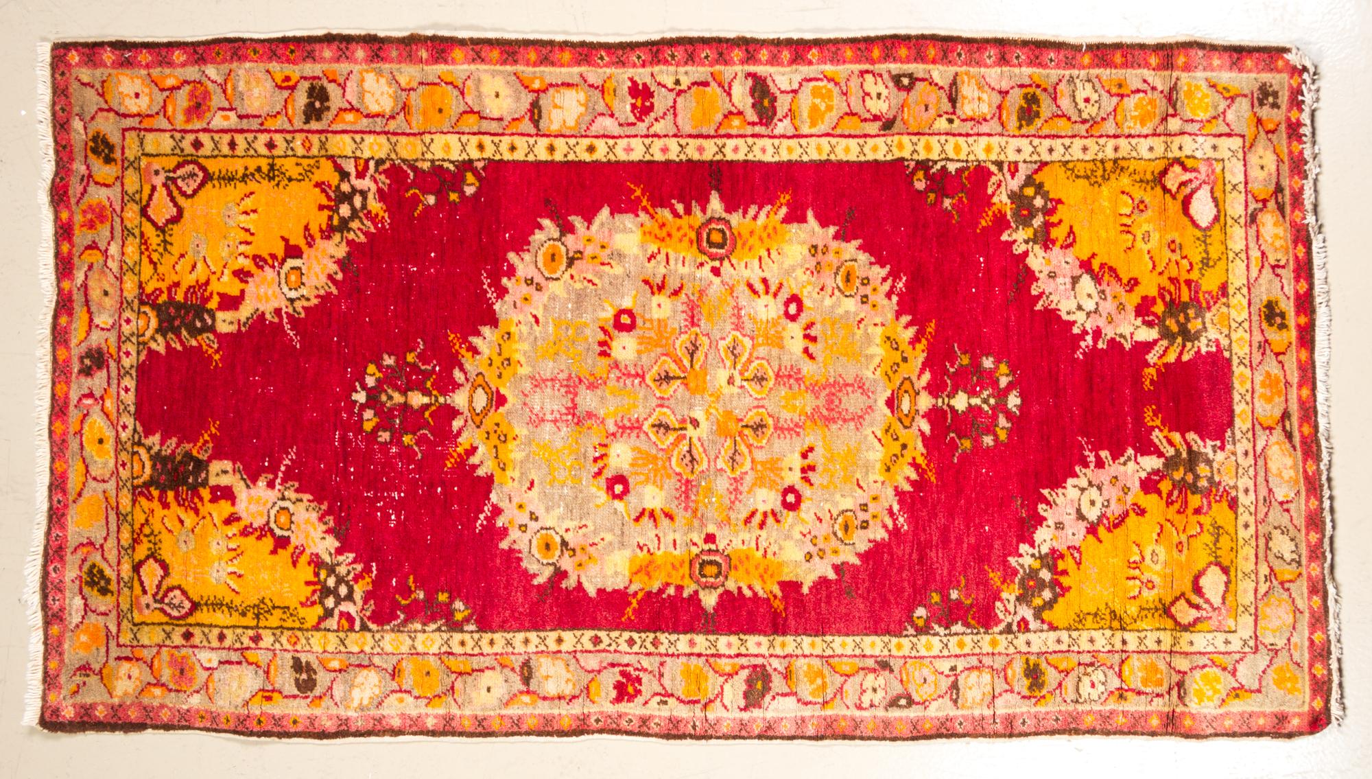 A Persian Wool Mat 5 feet 6 inches x 3 feet.