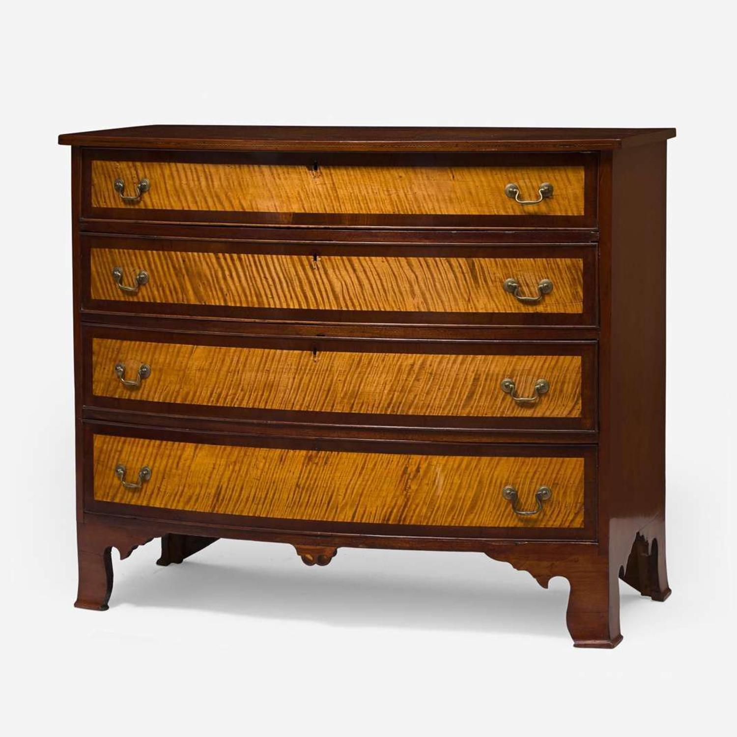 A Federal bowfront inlaid cherry and tiger maple chest of drawers New Hampshire, circa 1800