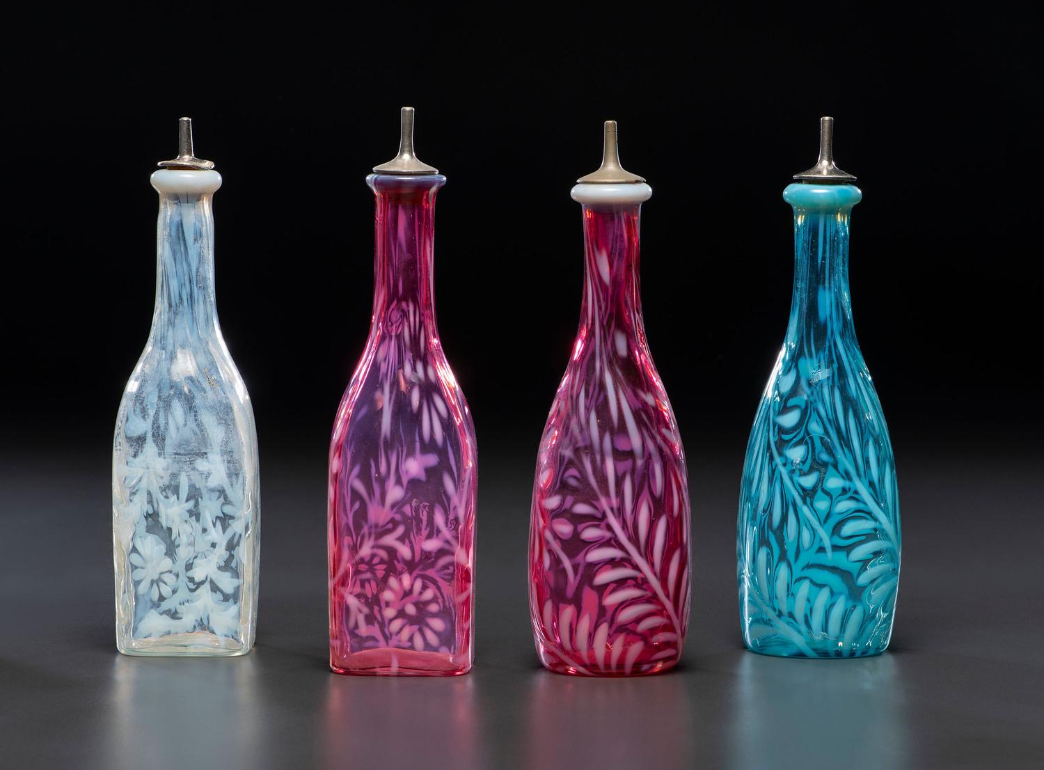 Four Fern Opalescent Glass Barber's Bottles