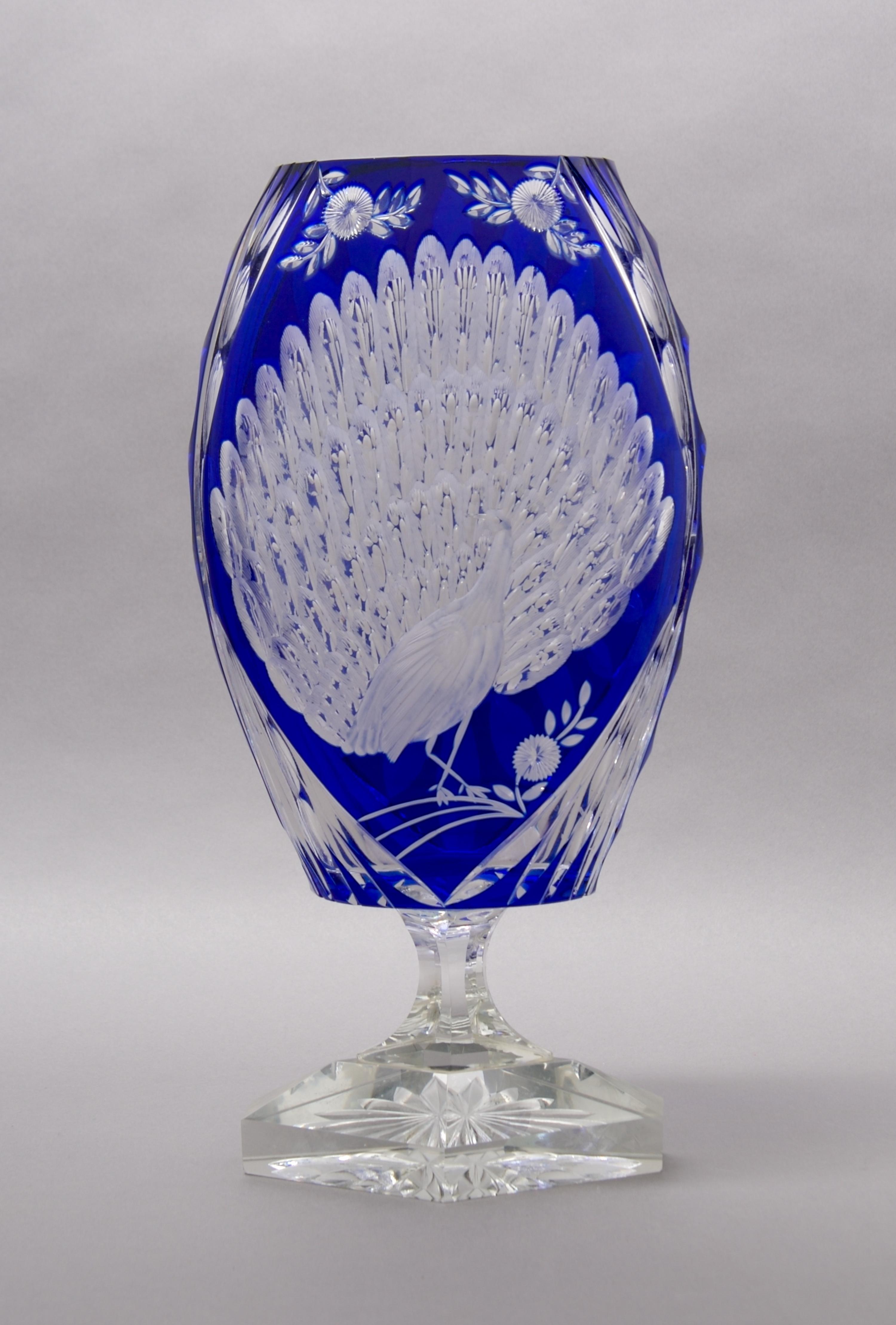 A Bohemian Cut-to-Clear Glass Vase, Height 14 1/8 inches.