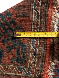 A Baluchi Wool Rug
