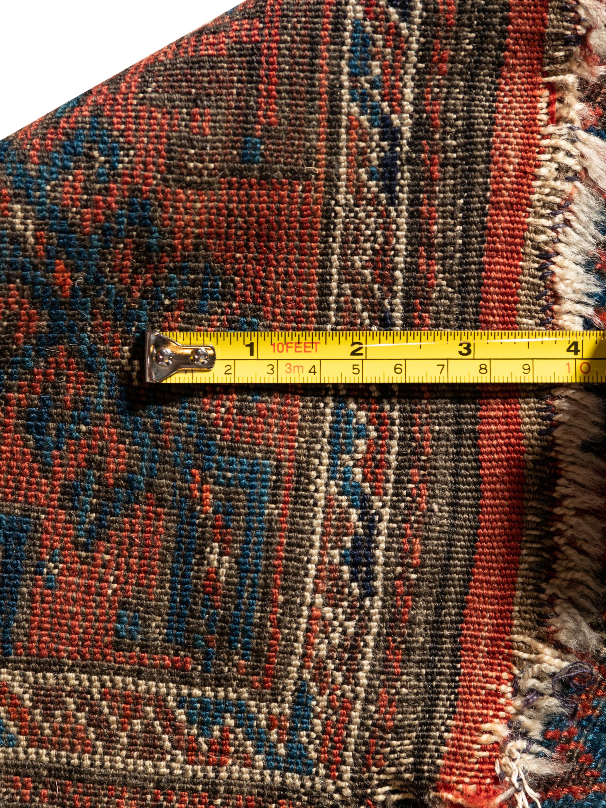 A Baluchi Wool Rug