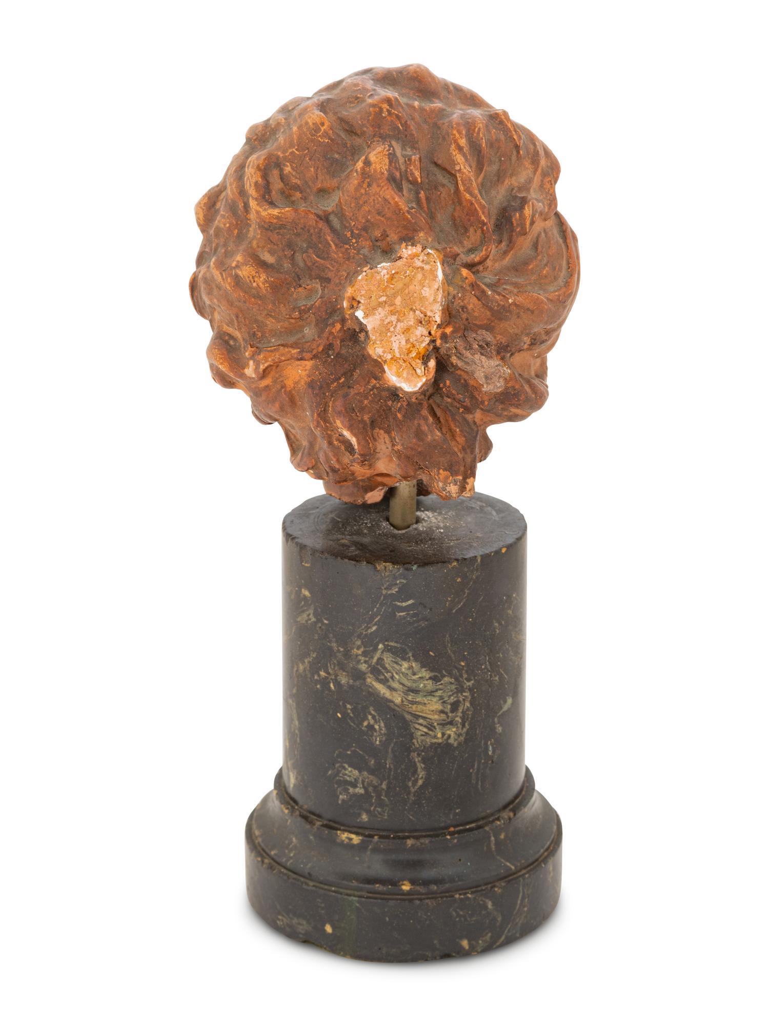 A Continental Terra Cotta Head of a Child