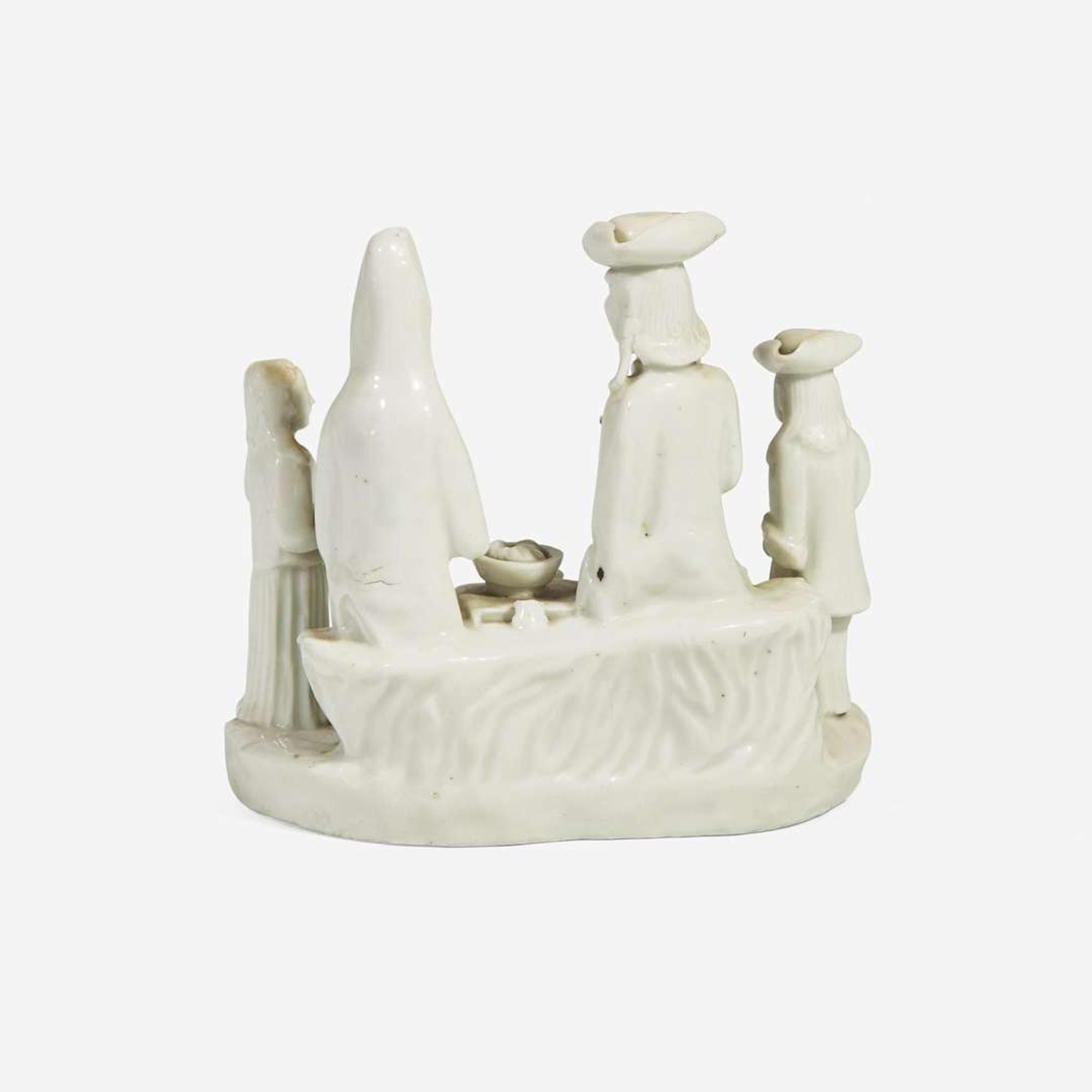 A Chinese Export blanc-de-chine porcelain group of a Dutch family Dehua, early 18th century