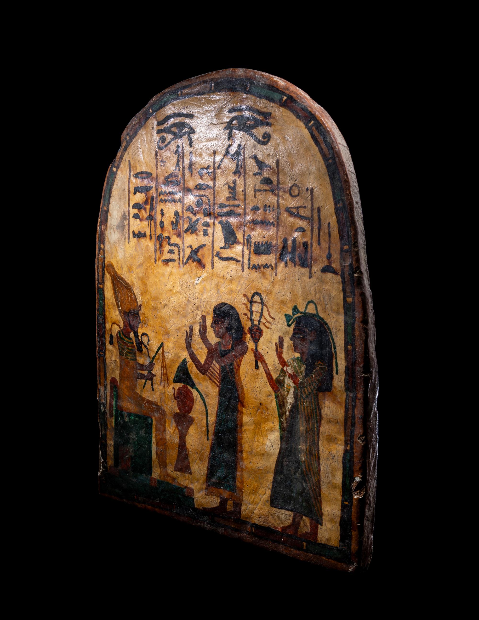An Egyptian Painted Wood Round-Top Stele