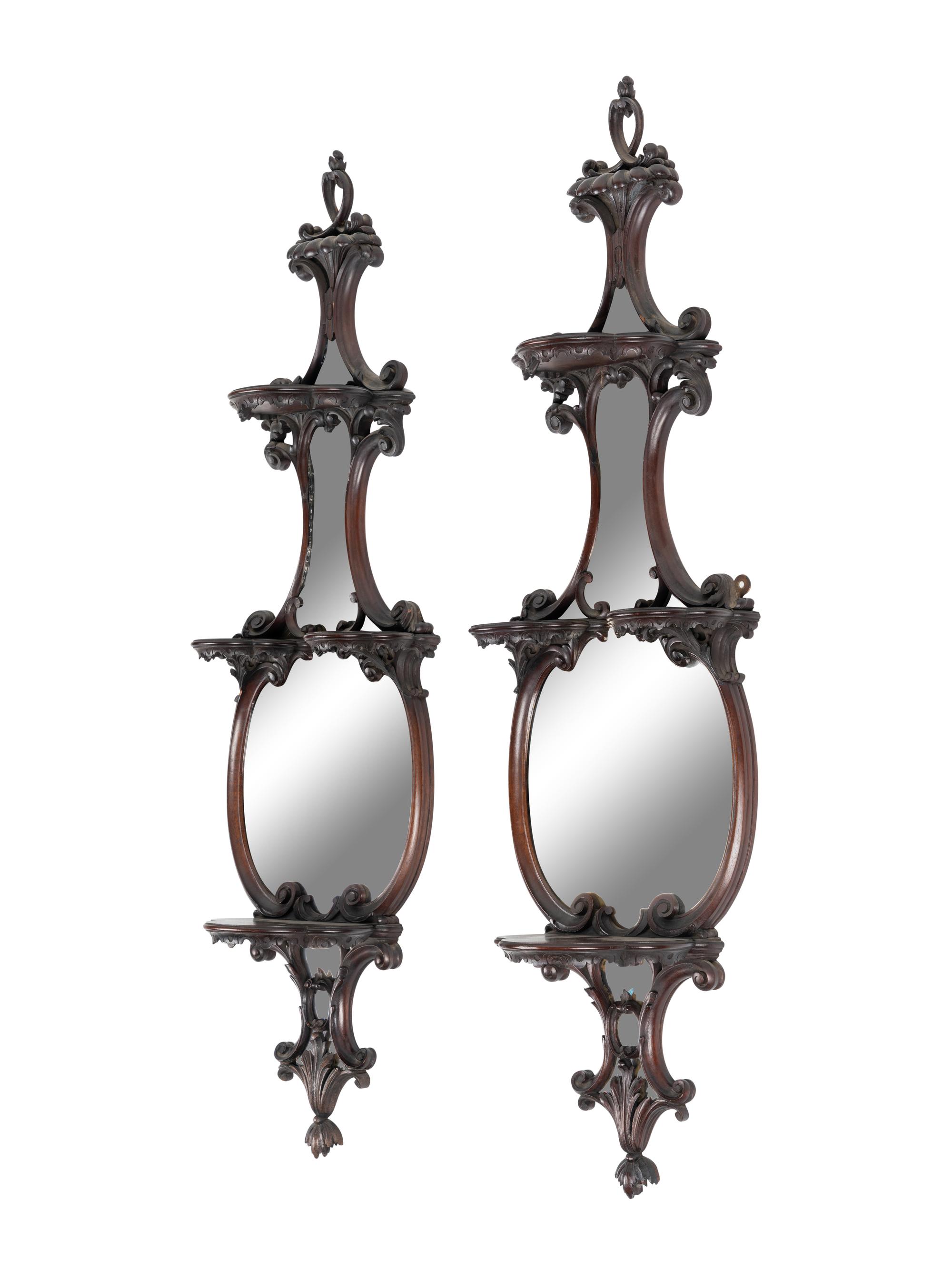 A Pair of George III Style Mirrored and Carved Mahogany Wall Brackets
