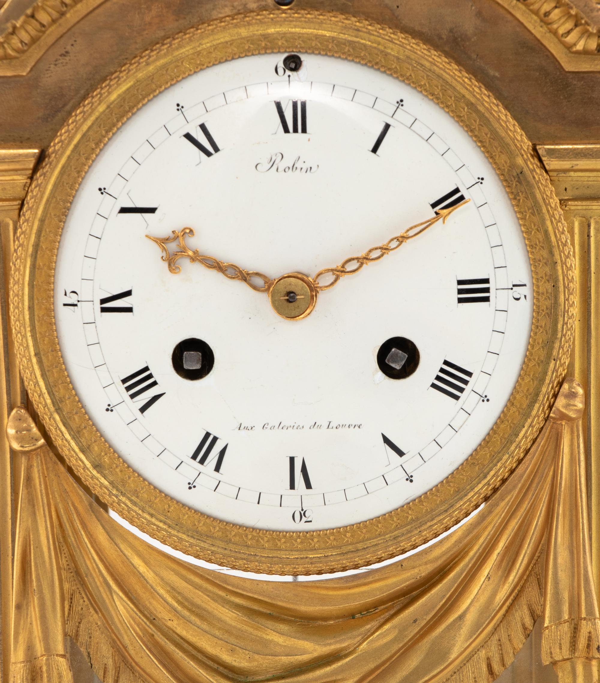 A Louis XVI Gilt Bronze Mantel Clock