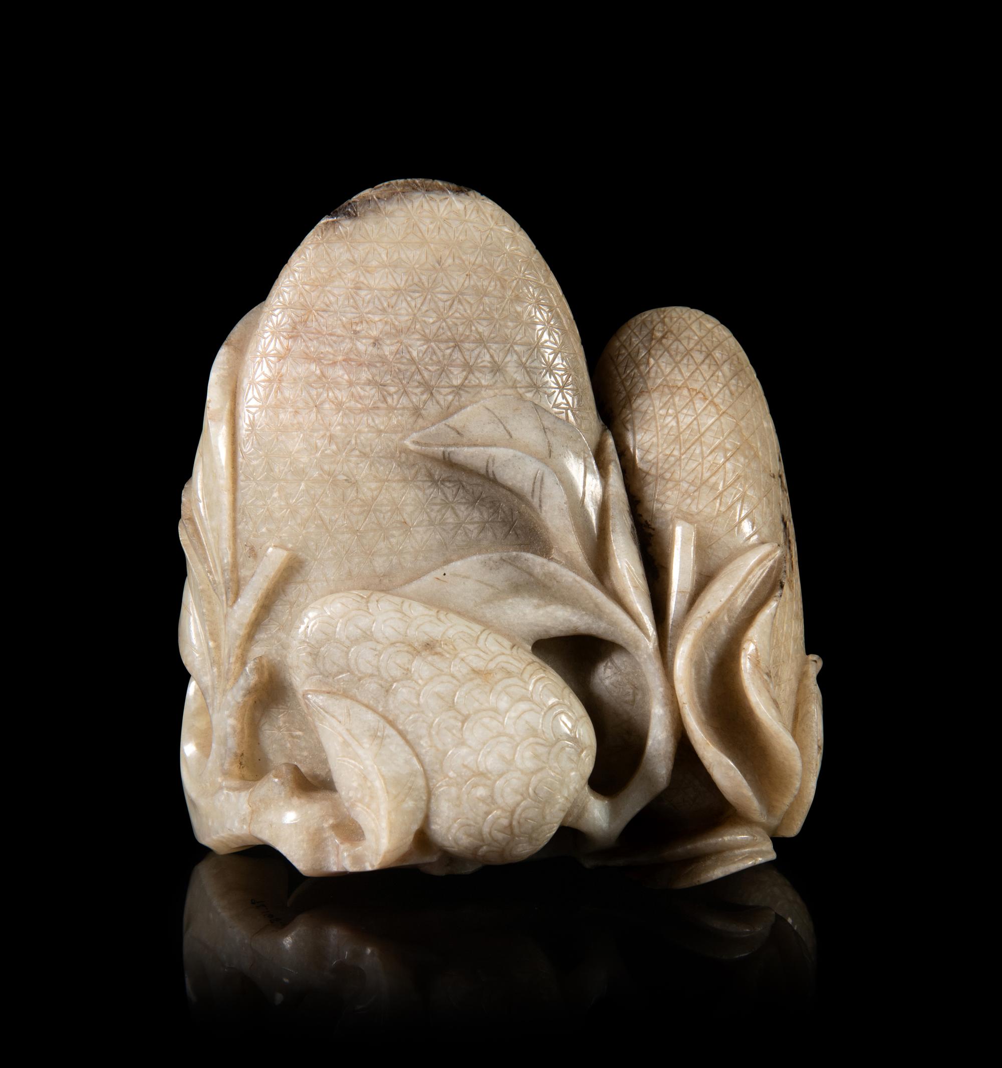 A Chicken Bone Jade Carving of Fruits