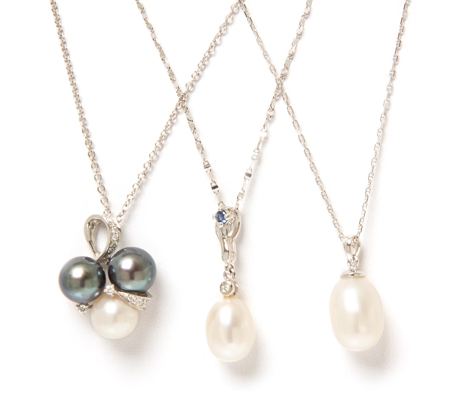 A Collection of 18 Karat White Gold, Cultured Pearl and Diamond Pendant Necklaces, Italy, 7.30 dwts.