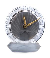 A French Frosted Glass Clock from the S.S. Normandie Height 6 inches. — PRODUCED BY ATO CLOCK CO. IN COLLABORATION WITH RENE LALIQUE, CIRCA 1935