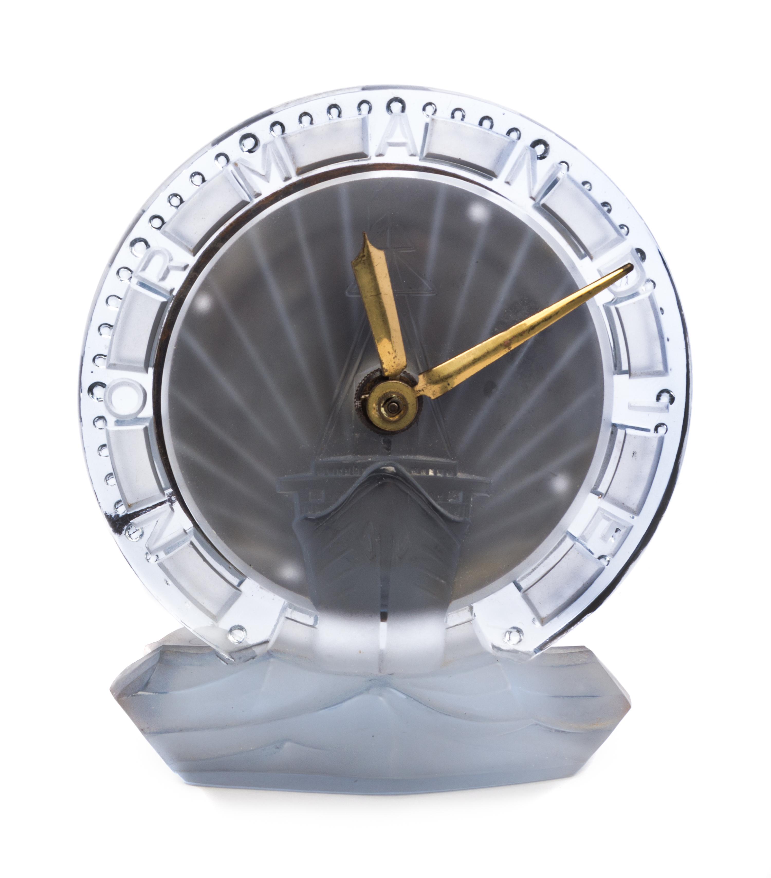 A French Frosted Glass Clock from the S.S. Normandie Height 6 inches. — PRODUCED BY ATO CLOCK CO. IN COLLABORATION WITH RENE LALIQUE, CIRCA 1935