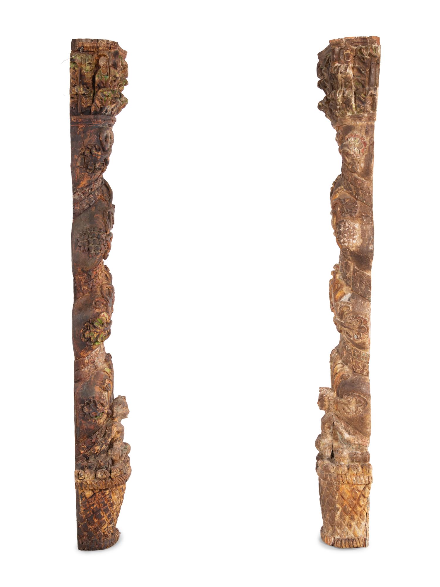 A Pair of Carved and Polychrome Painted Columns