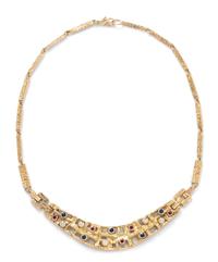 A Modernist 18 Karat Yellow Gold, Diamond, Ruby and Sapphire Necklace,