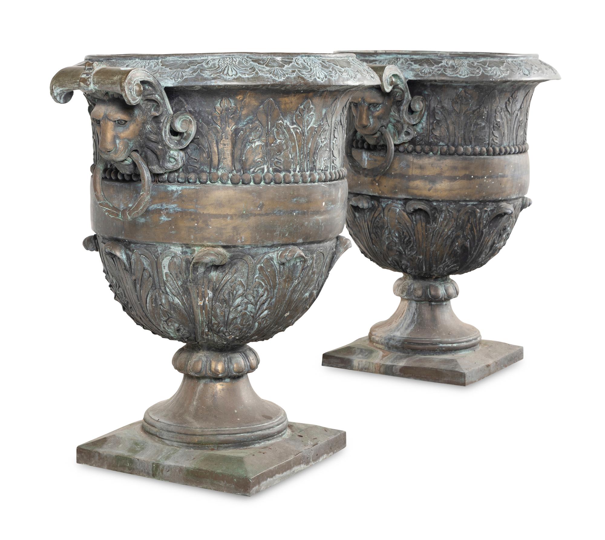 A Pair of Cast Metal Garden Urns