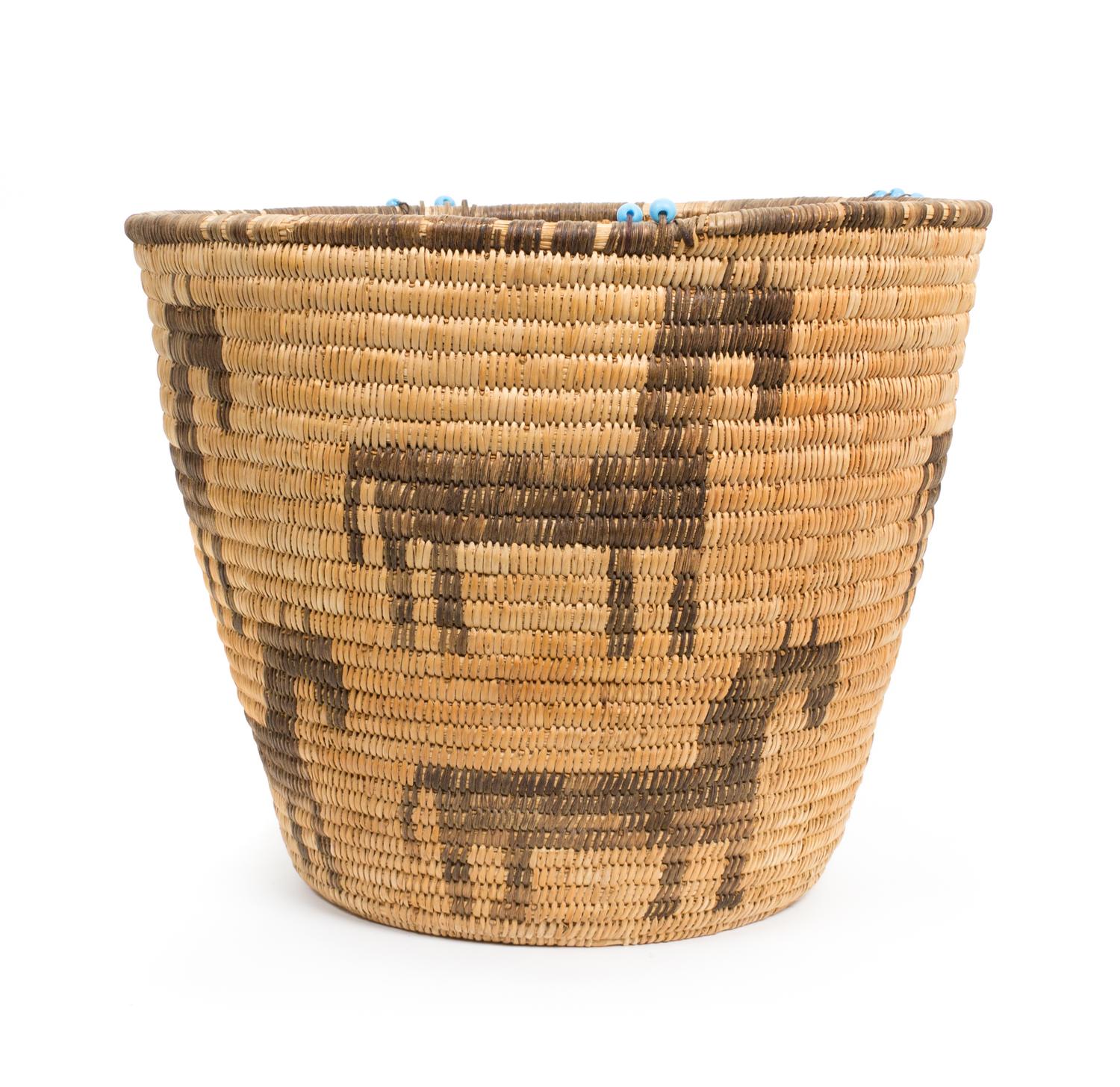 A Tohono O'odham Basket Height 10 3/4 x diameter 13 inches.