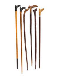A Group of Folk Art Carved Shoe-Form Canes