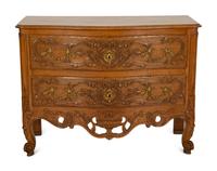 A French Provincial Carved Oak Commode